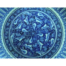 Blue and white charger, solar disc on a dish with sun rays